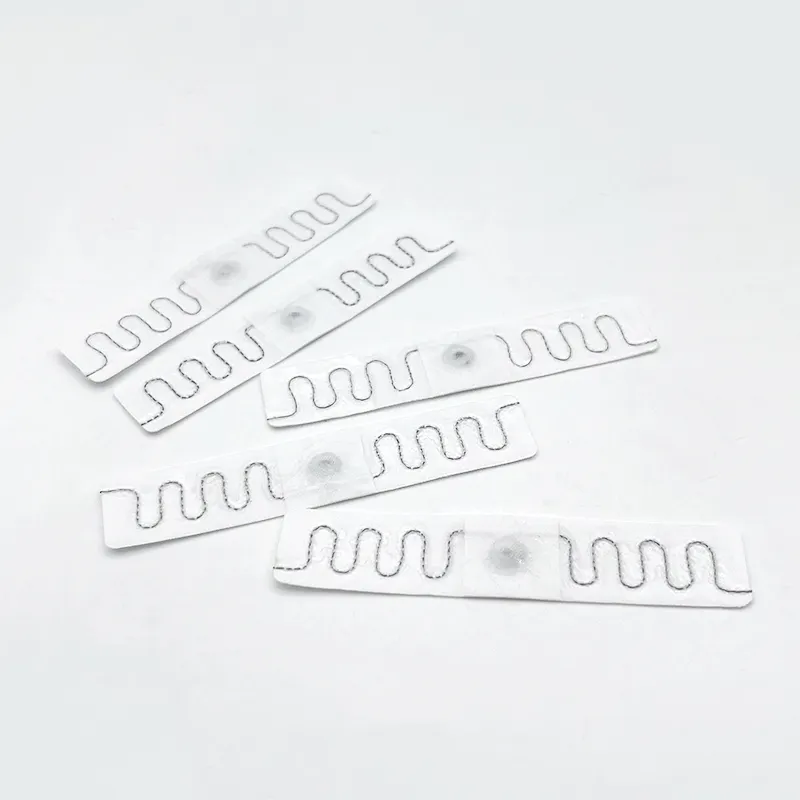 Heat-pressed RFID tags in industrial laundry Heat-pressed RFID tags in industrial laundry